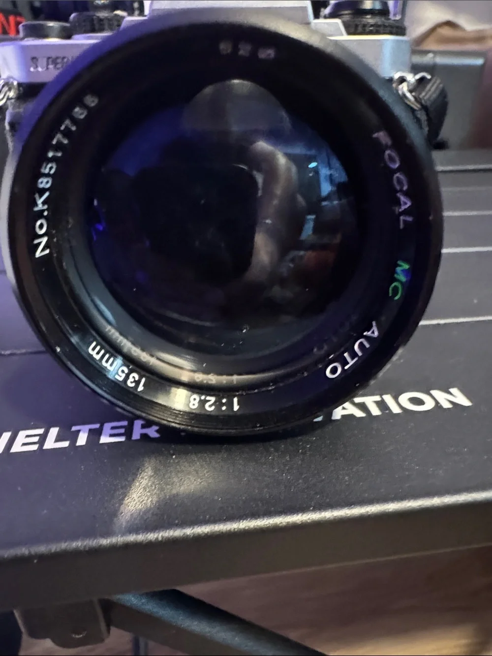Pentax Silver and Black SLR with 135mm Telephoto Lens